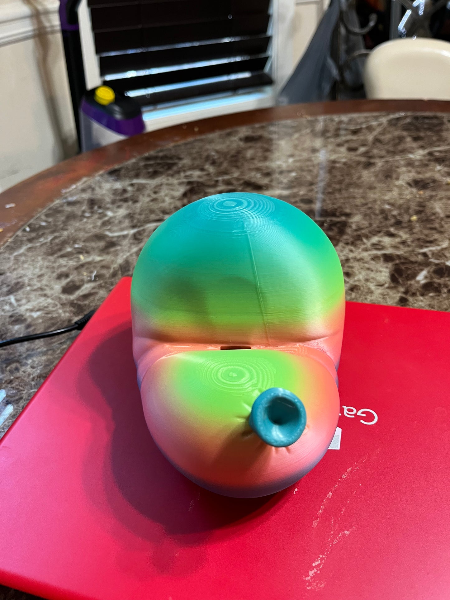 Deflated balloon phone holder